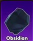 Dark angular Obsidian rock.
