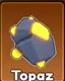Topaz ore with yellow crystals.